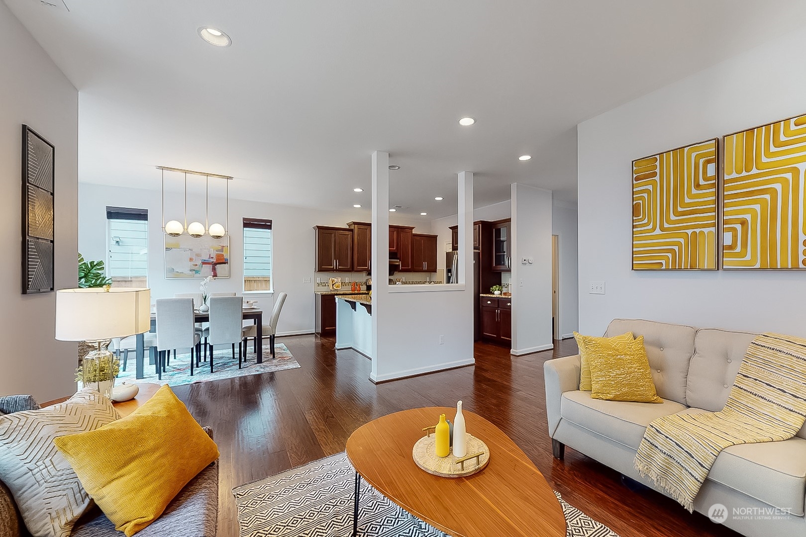 3602 195th Place Southeast Bothell, WA 98012 - Photo 6 of 28 a living room with furniture kitchen view and a wooden floor