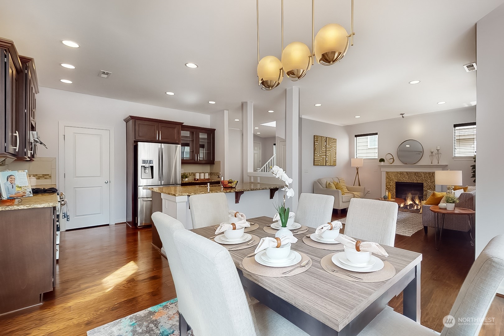 3602 195th Place Southeast Bothell, WA 98012 - Photo 10 of 28 a view of a dining room with furniture and wooden floor