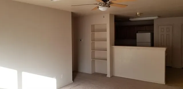 a view of a hallway with a closet