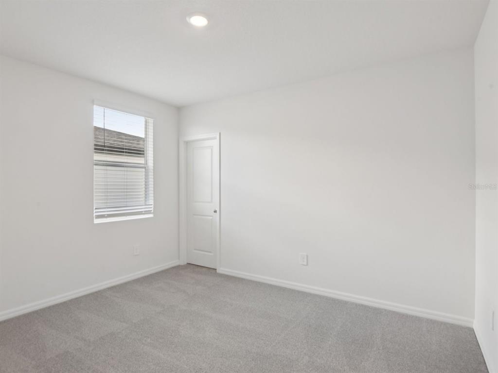1655 Bark Rdg Drive Auburndale, FL 33823 - Photo 11 of 21 a view of an empty room with a window