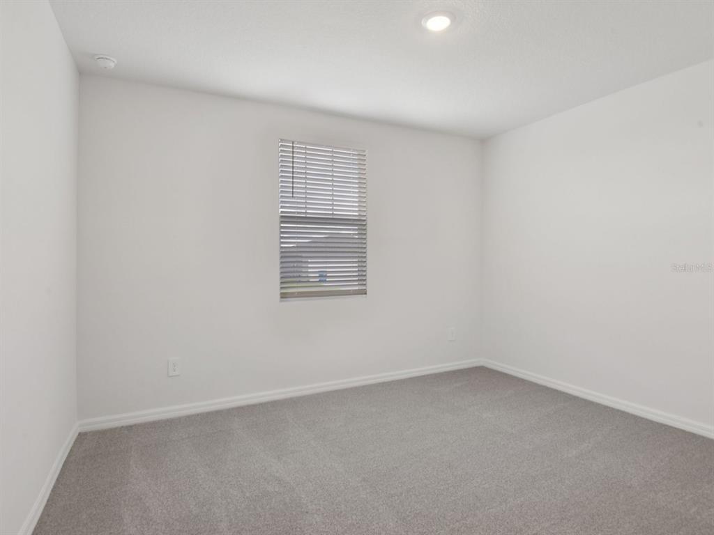1655 Bark Rdg Drive Auburndale, FL 33823 - Photo 13 of 21 an empty room with a window