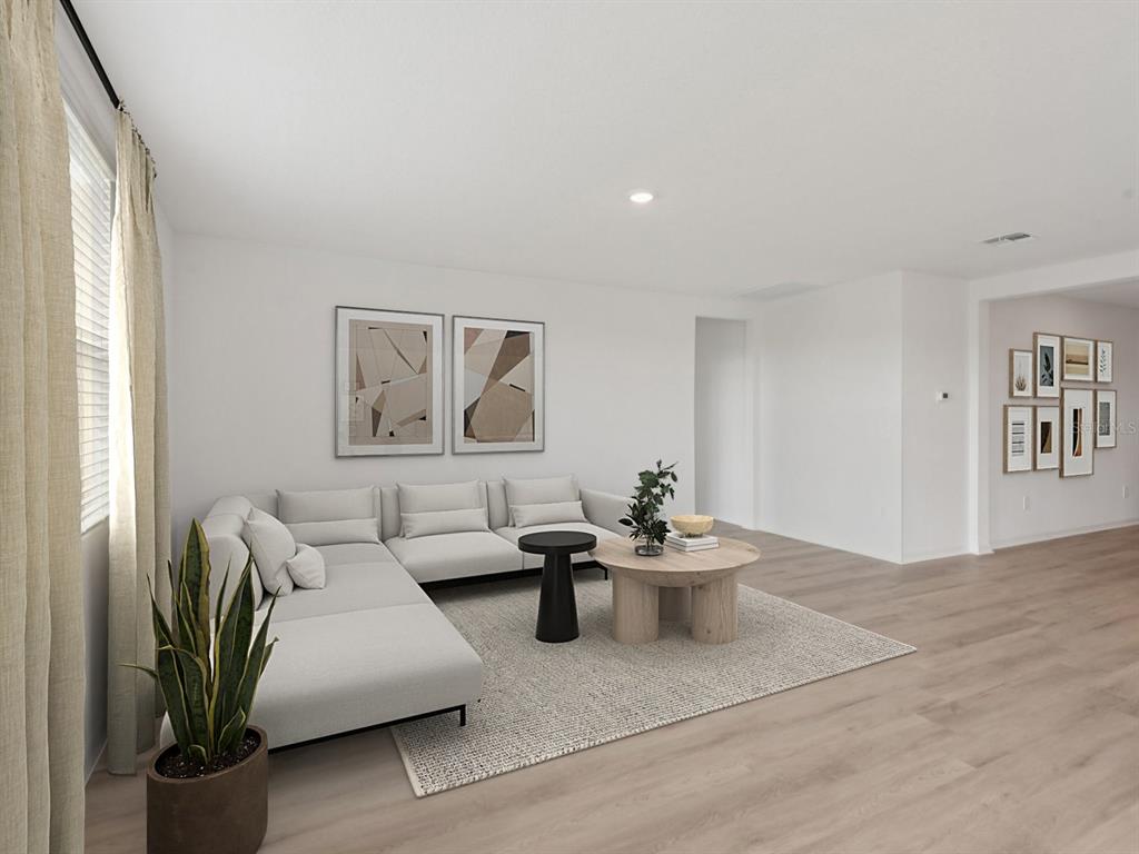 1655 Bark Rdg Drive Auburndale, FL 33823 - Photo 2 of 21 a living room with furniture and wooden floor