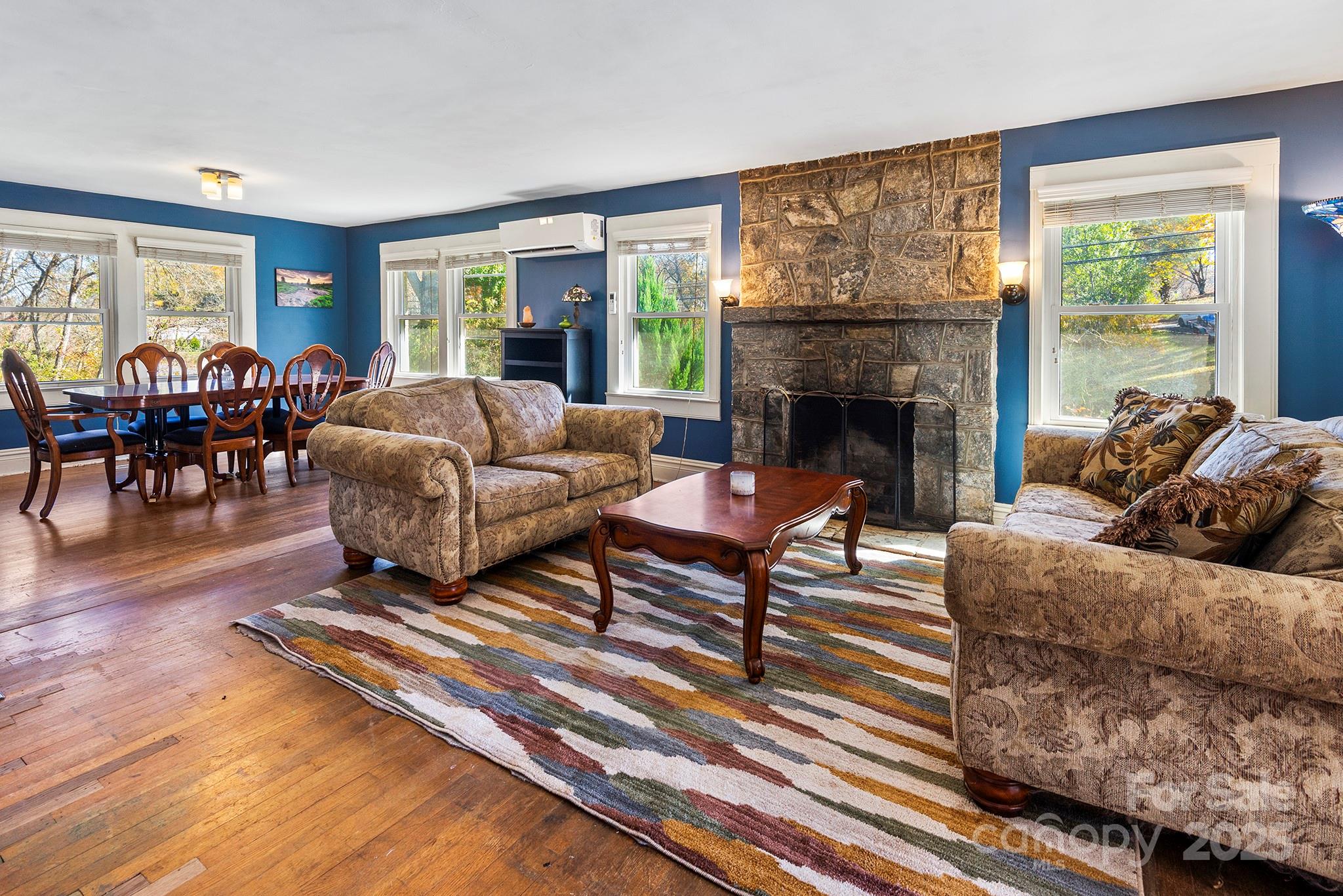 914 Catheys Creek Church Road Brevard, NC 28712 - Photo 13 of 33 a living room with furniture fireplace and window