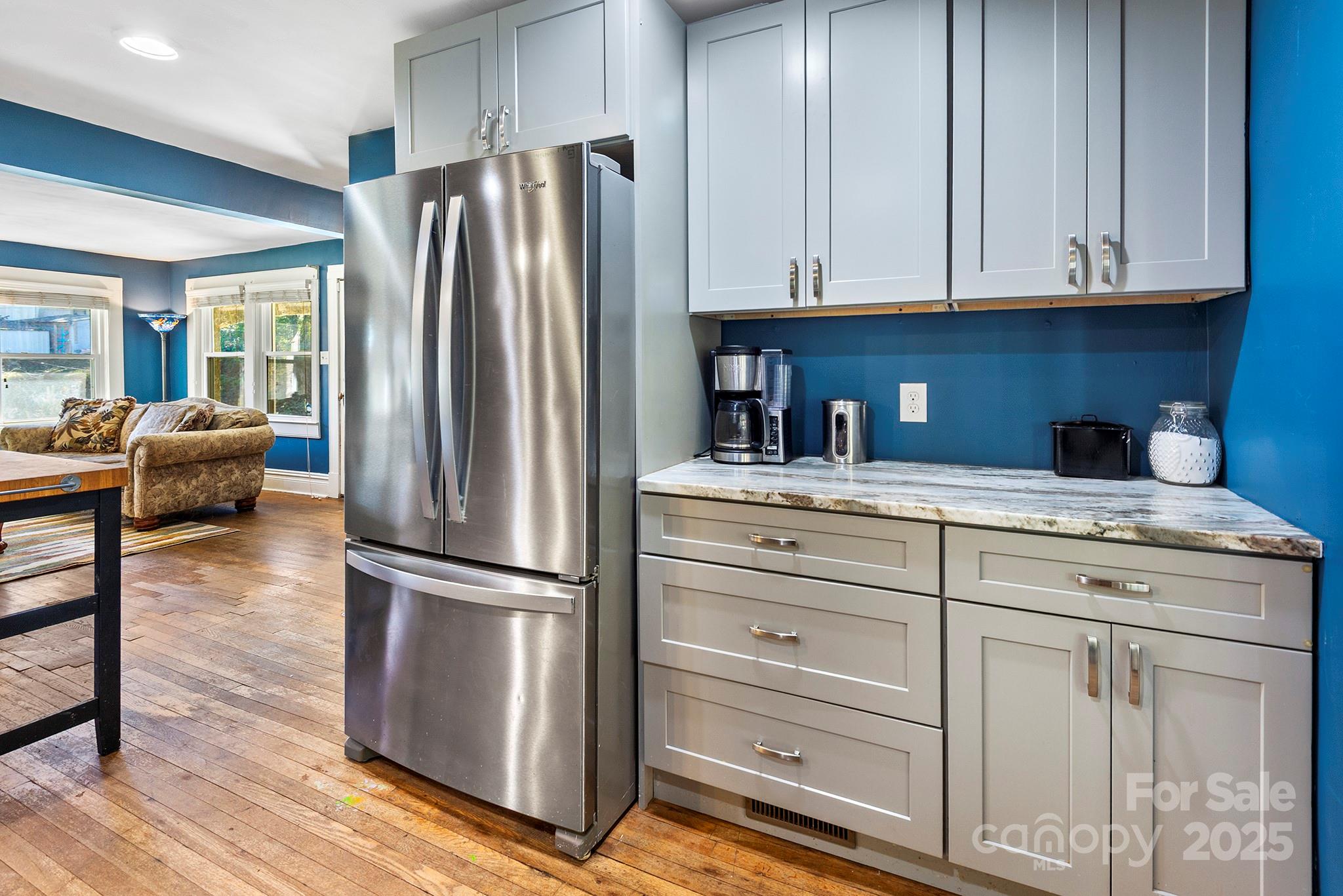 914 Catheys Creek Church Road Brevard, NC 28712 - Photo 19 of 33 a kitchen with appliances cabinets and a counter space