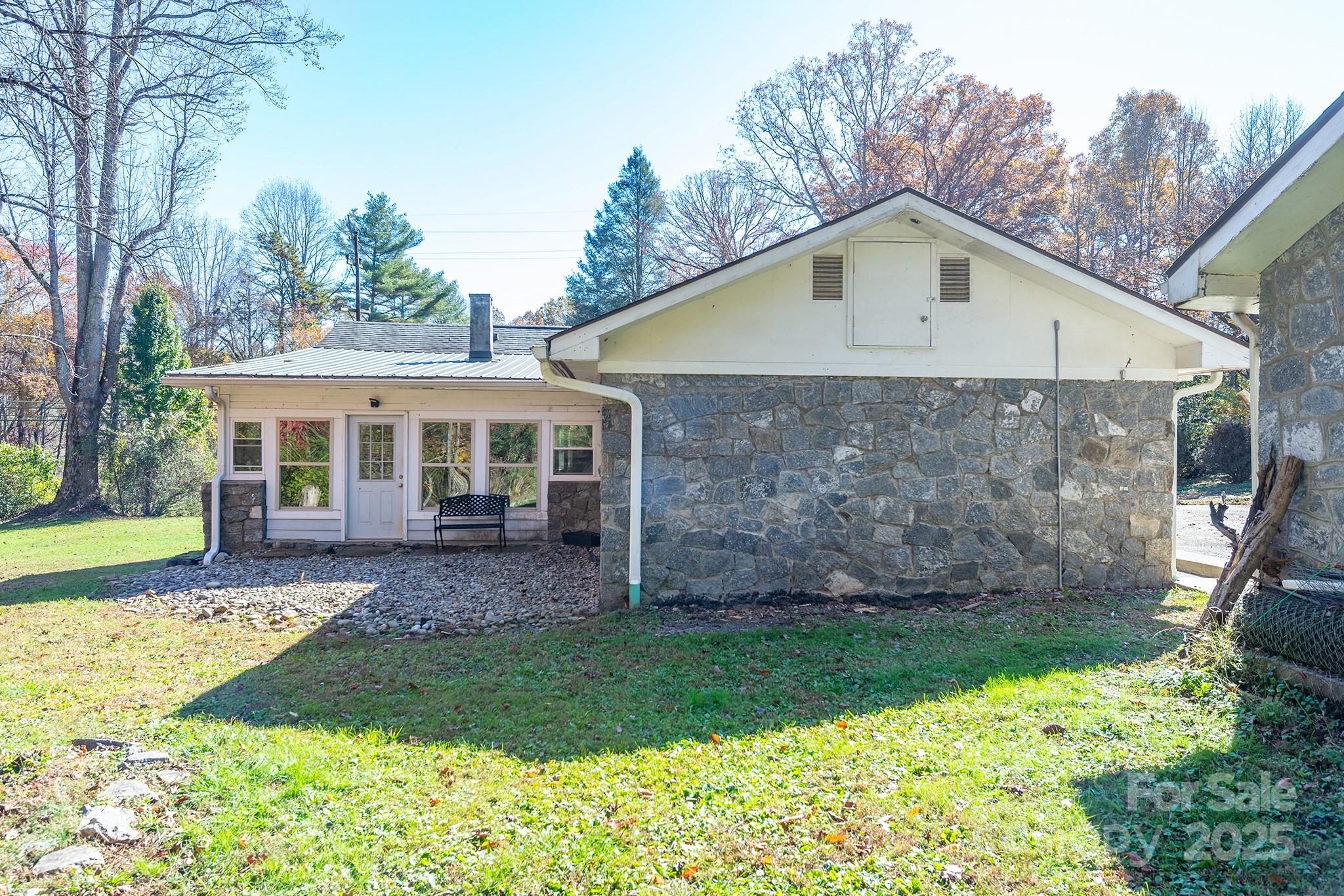 914 Catheys Creek Church Road Brevard, NC 28712 - Photo 7 of 33 front view of a house with a yard