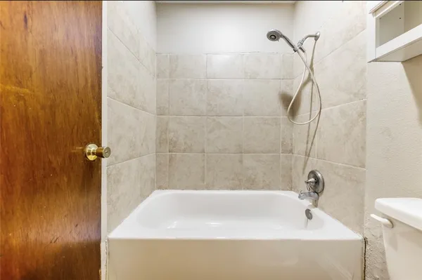 a bathroom with a bathtub