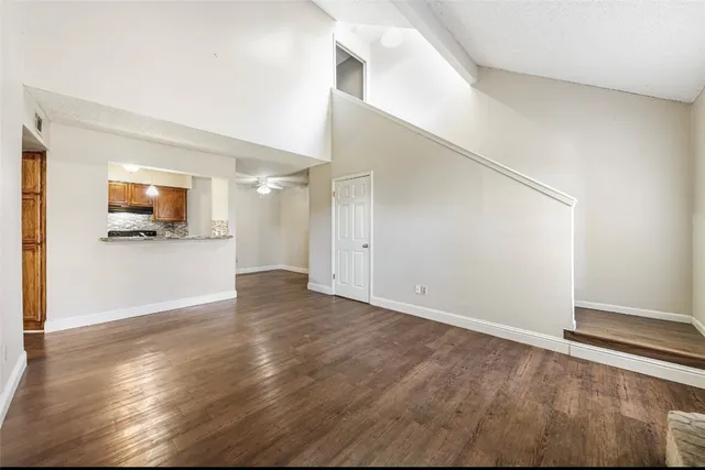 a view of a livingroom with wooden floor