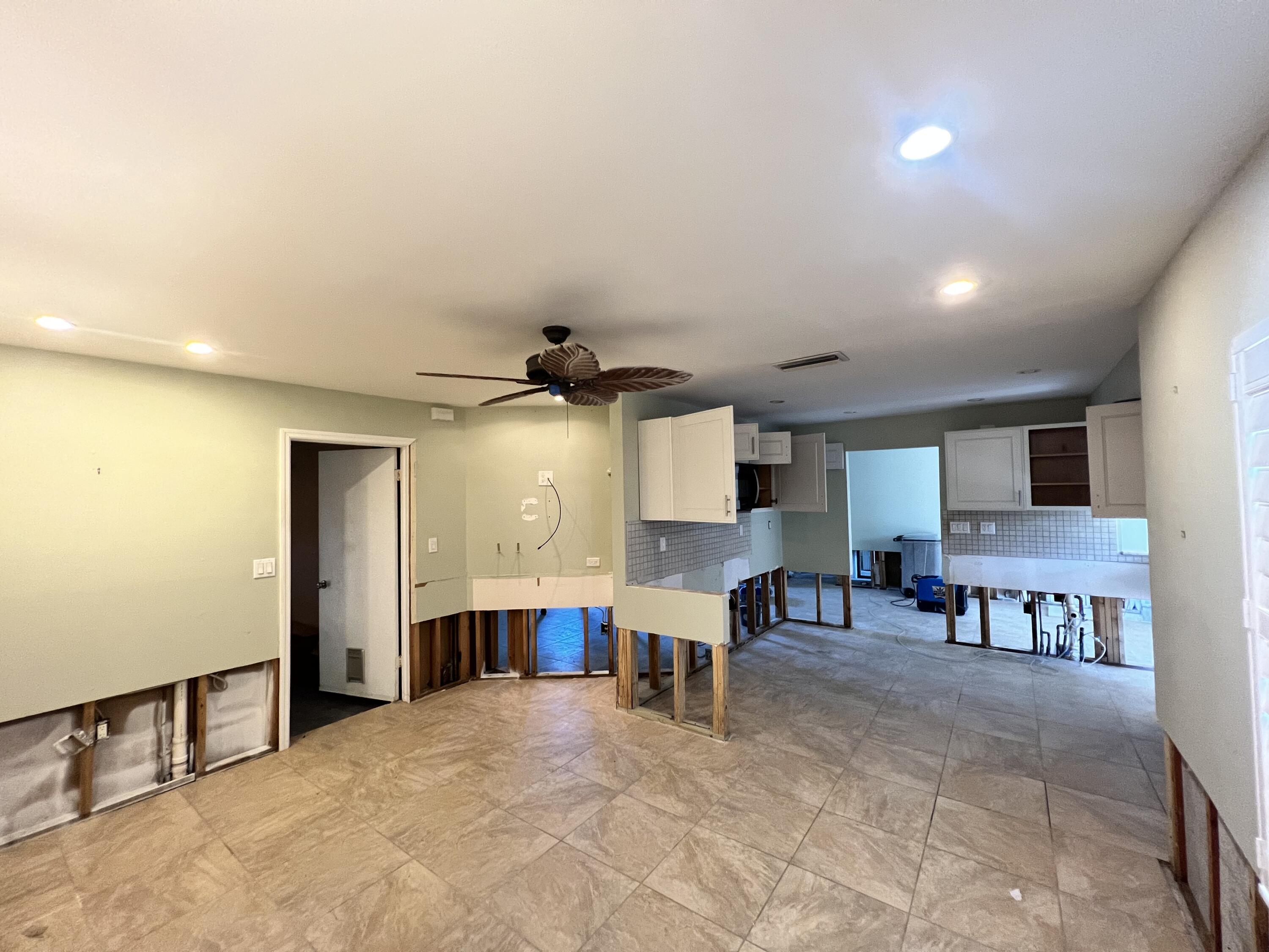 2392 Clipper Way Naples, FL 34104 - Photo 14 of 29 a view of living room with furniture and window