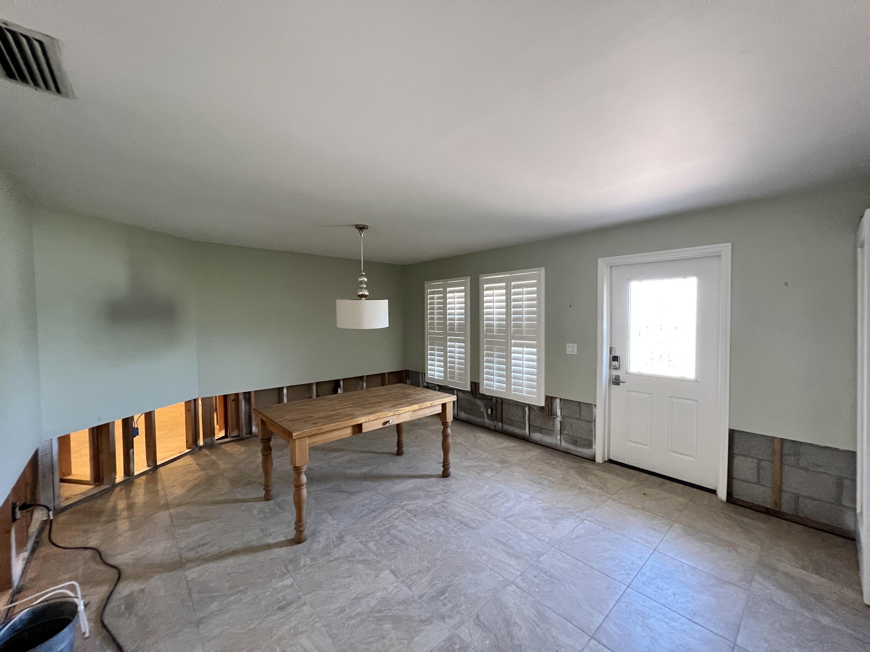 2392 Clipper Way Naples, FL 34104 - Photo 16 of 29 a view of an empty room with window