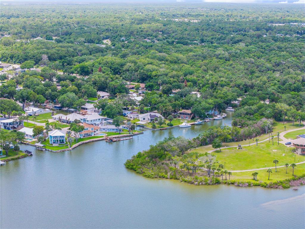 192 Azalea Road Edgewater, FL 32141 - Photo 7 of 94 an aerial view of a house with a swimming pool outdoor seating and yard