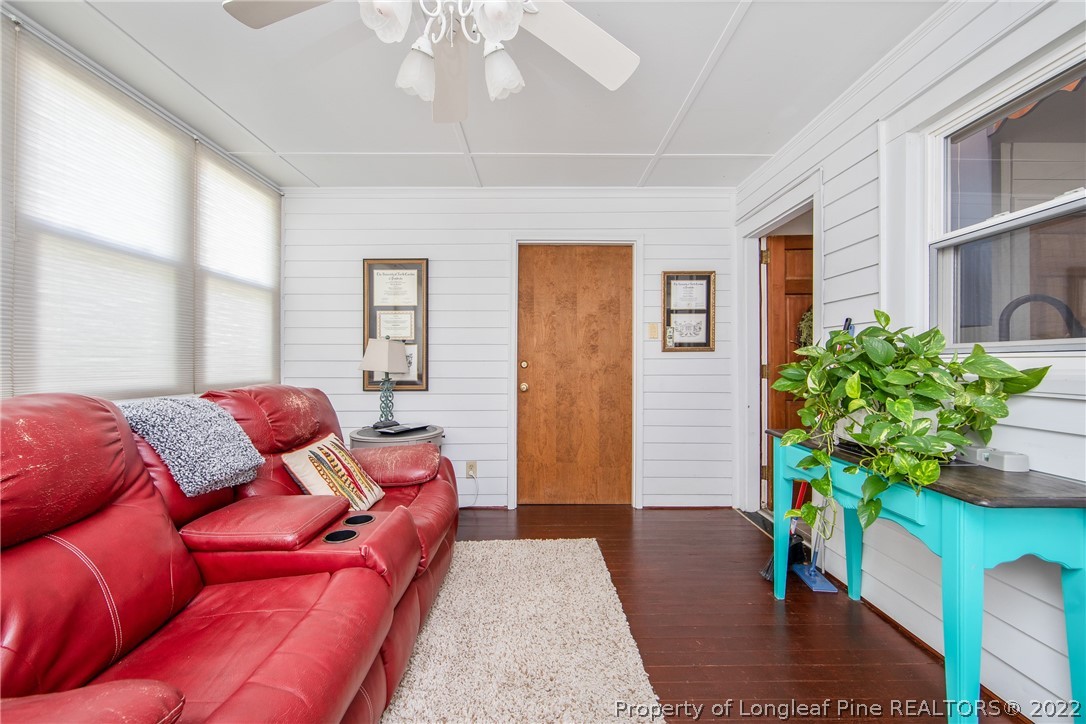 906 McKimmon Road Fayetteville, NC 28303 - Photo 17 of 33 a bedroom with a bed and a potted plant