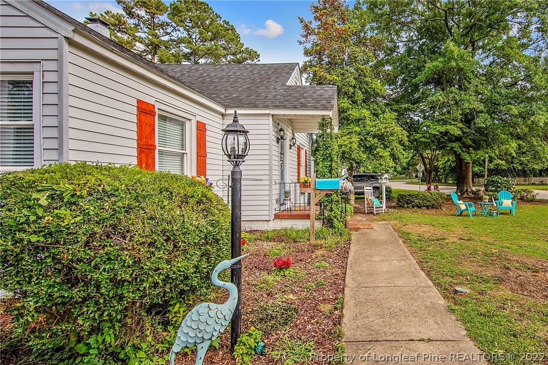 906 McKimmon Road Fayetteville, NC 28303 - Photo 2 of 33 a front view of a house with a yard