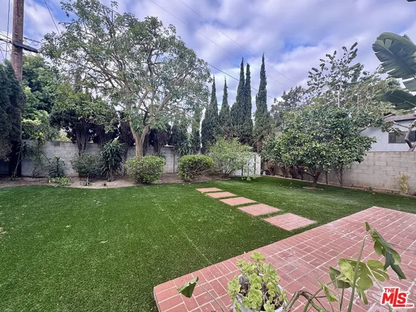 a garden view with a seating space