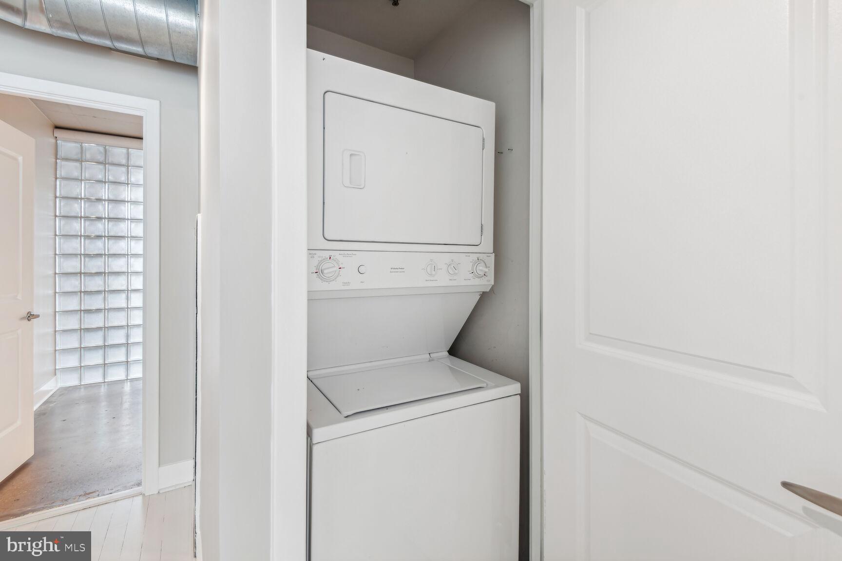 2125 14th Street Northwest, Unit 319 Washington, DC 20009 - Photo 17 of 23 a utility room with dryer and washer