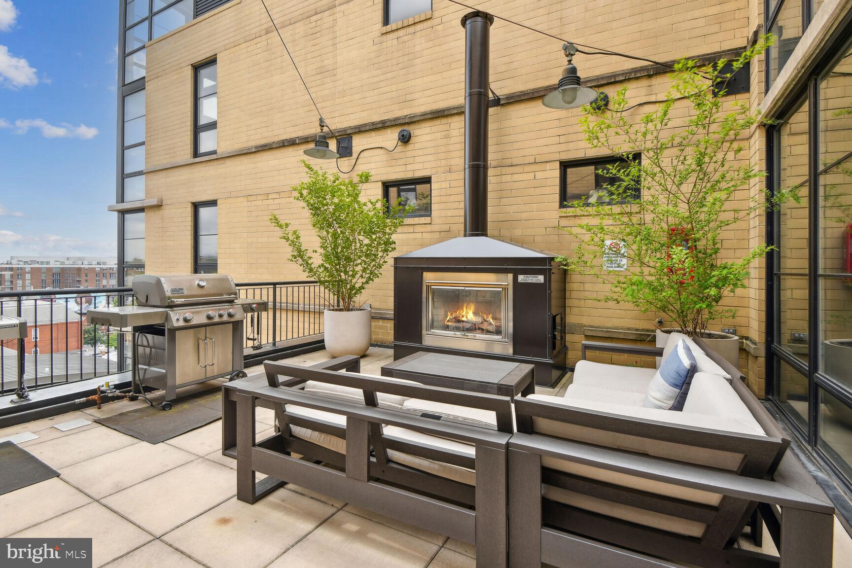 2125 14th Street Northwest, Unit 319 Washington, DC 20009 - Photo 18 of 23 a view of a balcony with chairs