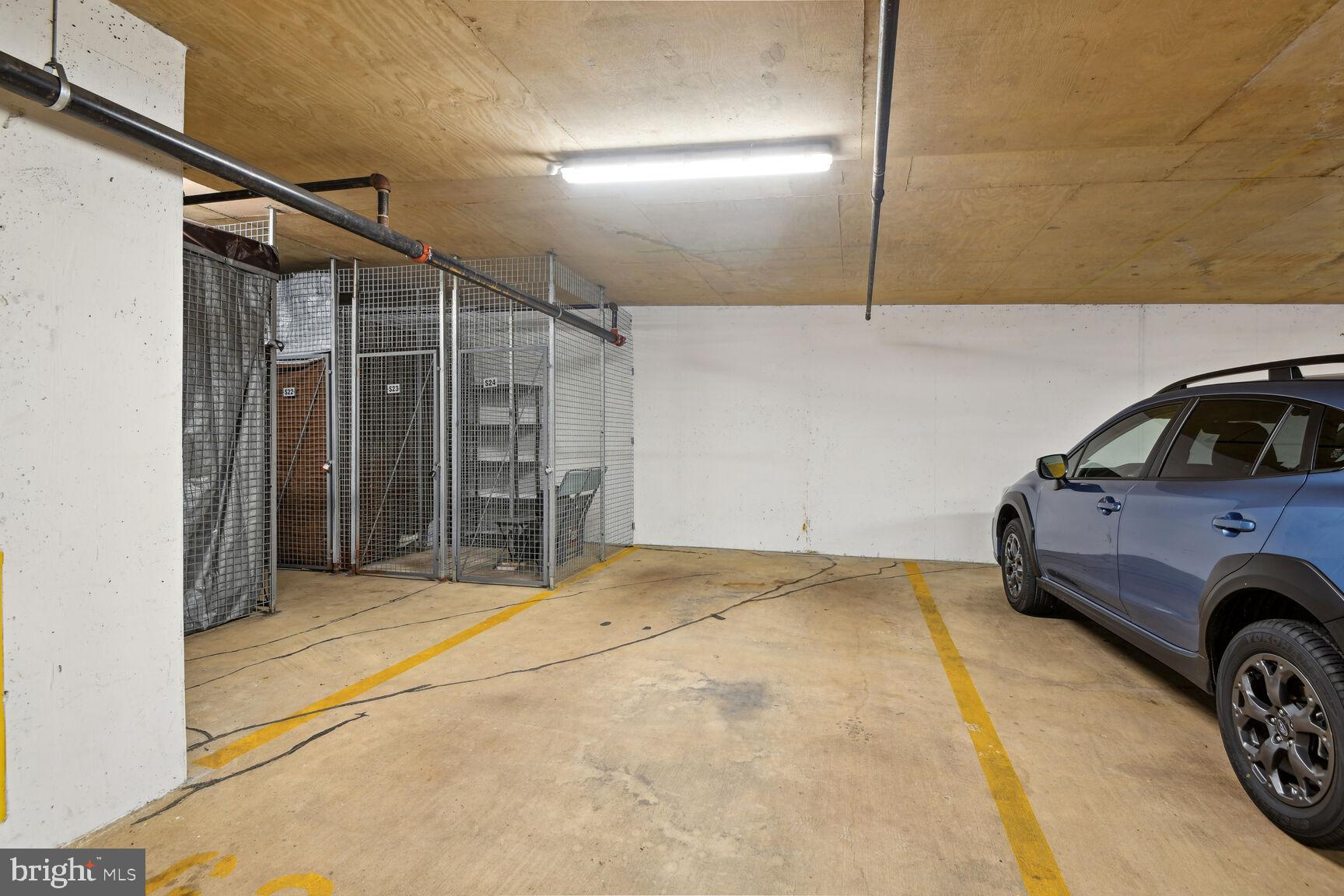 2125 14th Street Northwest, Unit 319 Washington, DC 20009 - Photo 22 of 23 a view of garage with a car parked in it