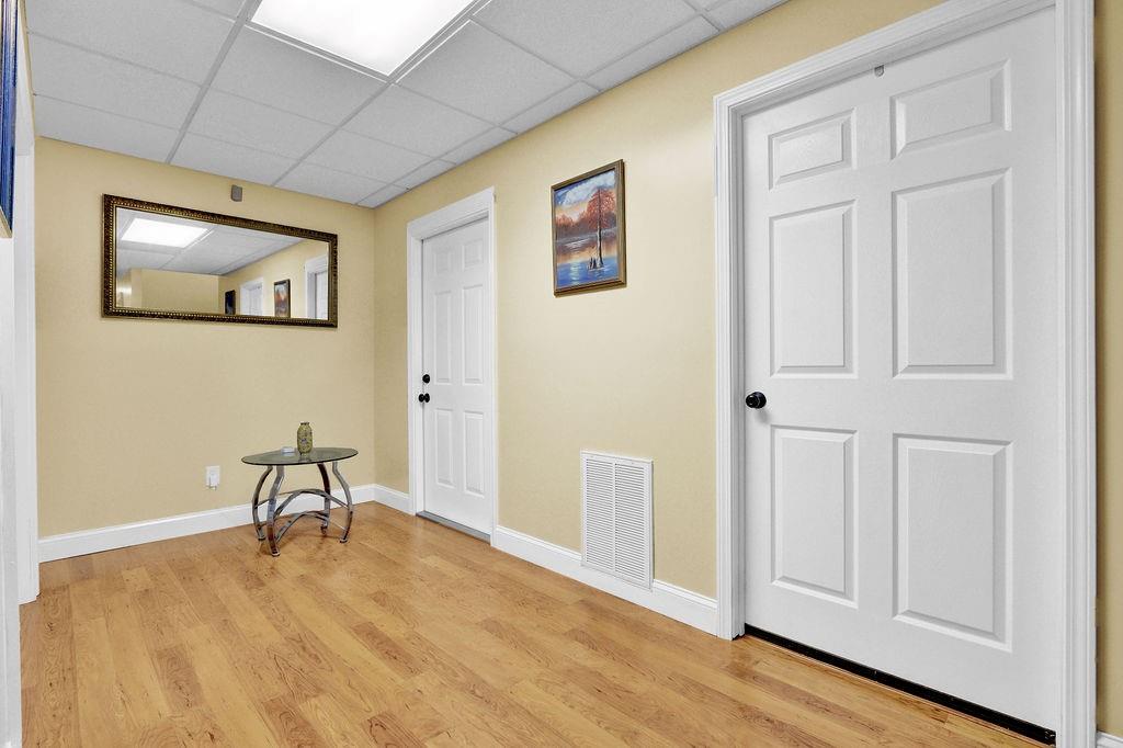 5636 River Stone Road Gainesville, GA 30506 - Photo 23 of 36 a view of a livingroom with furniture and wooden floor