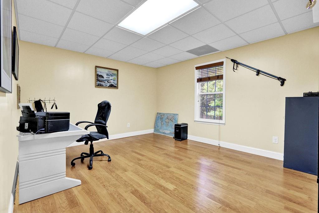 5636 River Stone Road Gainesville, GA 30506 - Photo 28 of 36 a view of a workspace with furniture and a window