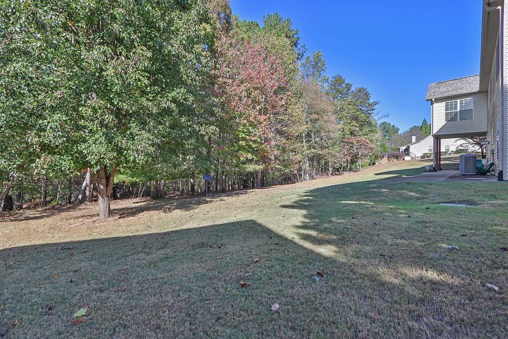 5636 River Stone Road Gainesville, GA 30506 - Photo 33 of 36 a view of a yard with a house