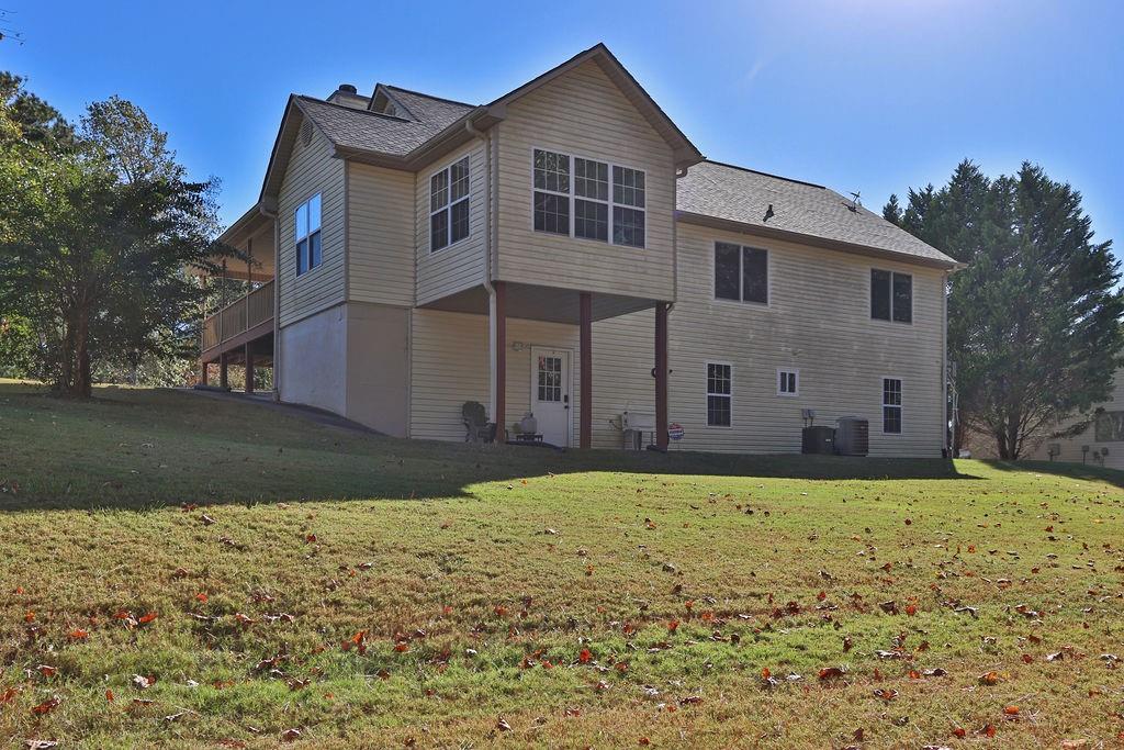 5636 River Stone Road Gainesville, GA 30506 - Photo 35 of 36 a house that has a big yard