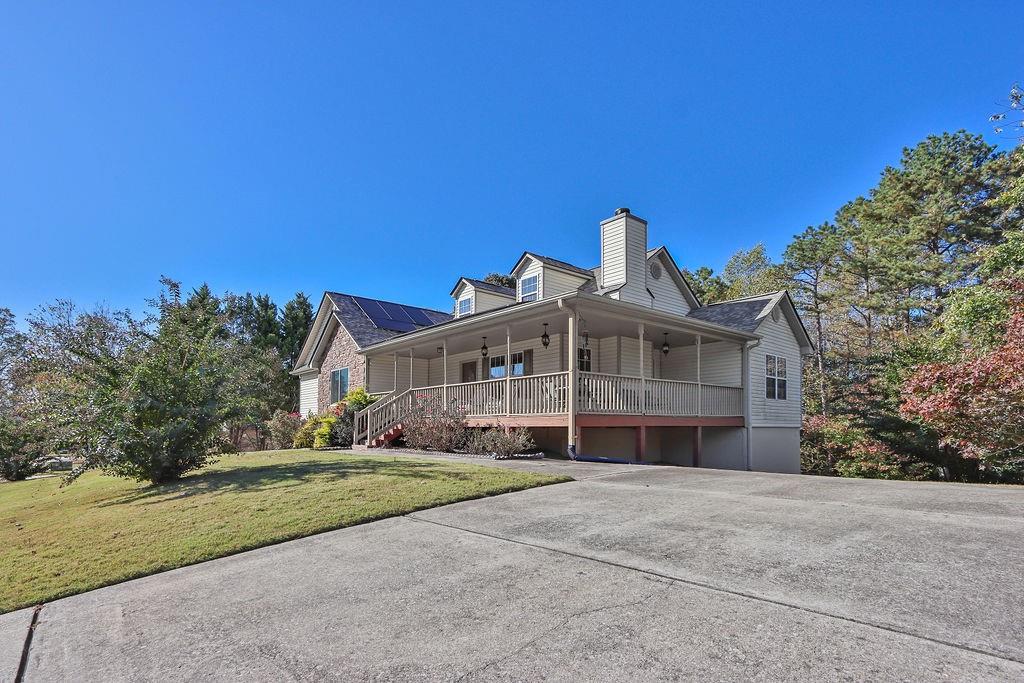 5636 River Stone Road Gainesville, GA 30506 - Photo 36 of 36 a front view of a house with a yard