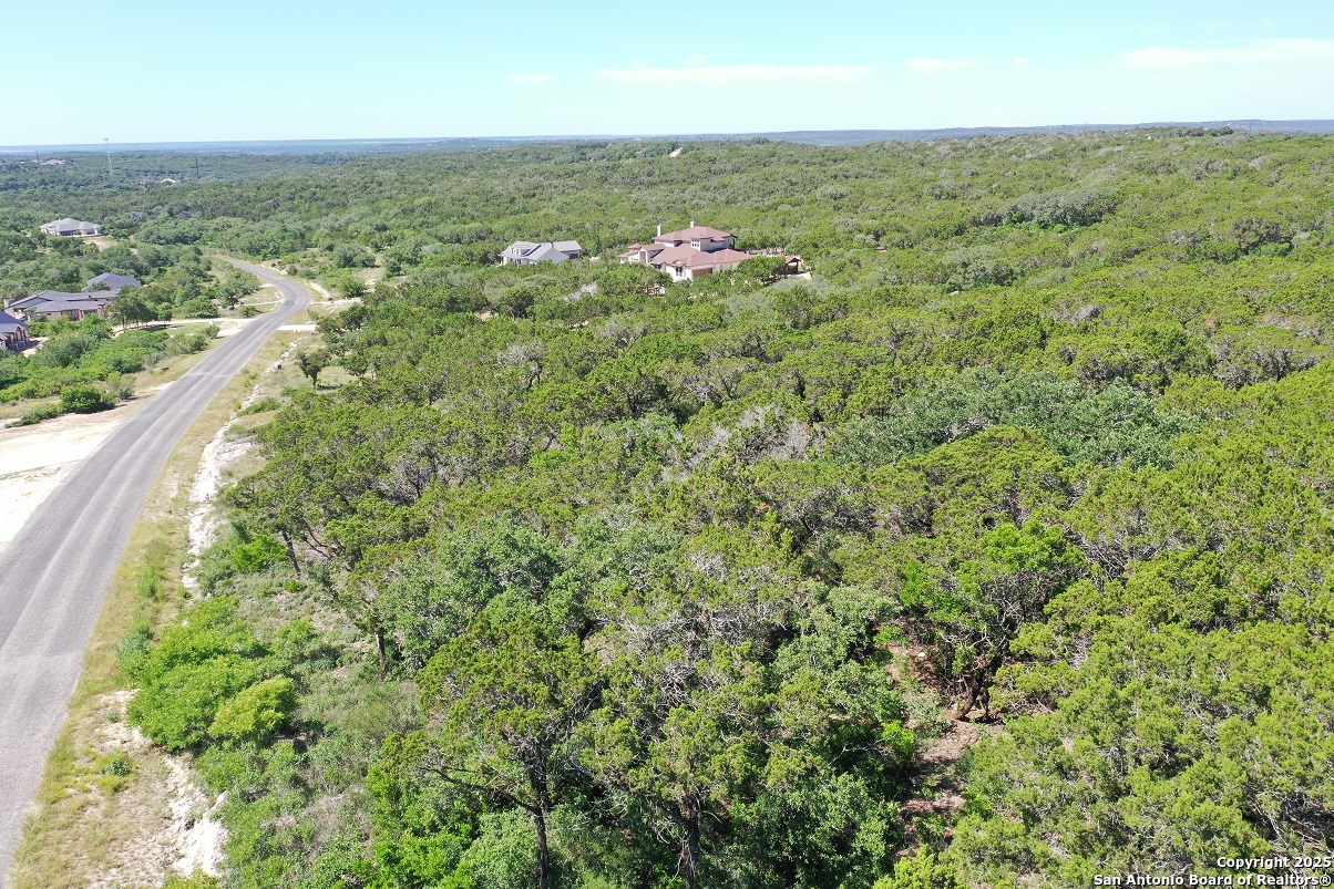 0 Pr 2775 Mico, TX 78056 - Photo 17 of 28 an aerial view of residential houses with outdoor space and trees