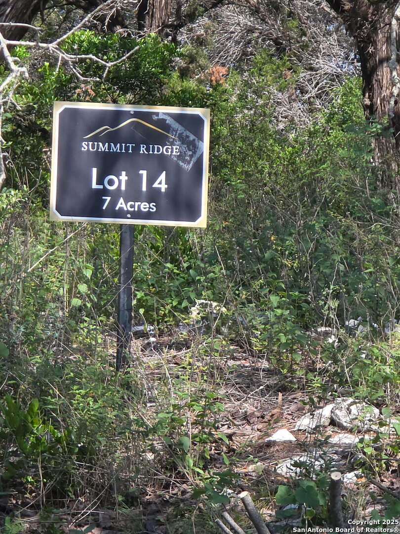 0 Pr 2775 Mico, TX 78056 - Photo 22 of 28 a sign that is sitting on a brick wall