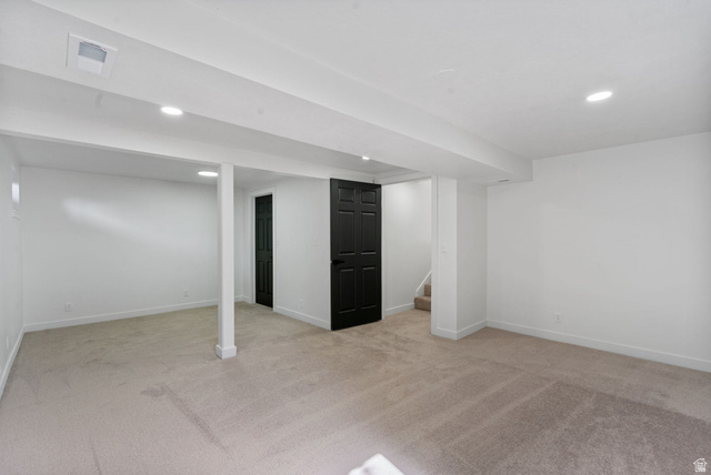 432 Calnette Drive Sandy, UT 84070 - Photo 24 of 48 Open finished lower level with plush carpeting and bright recessed lighting