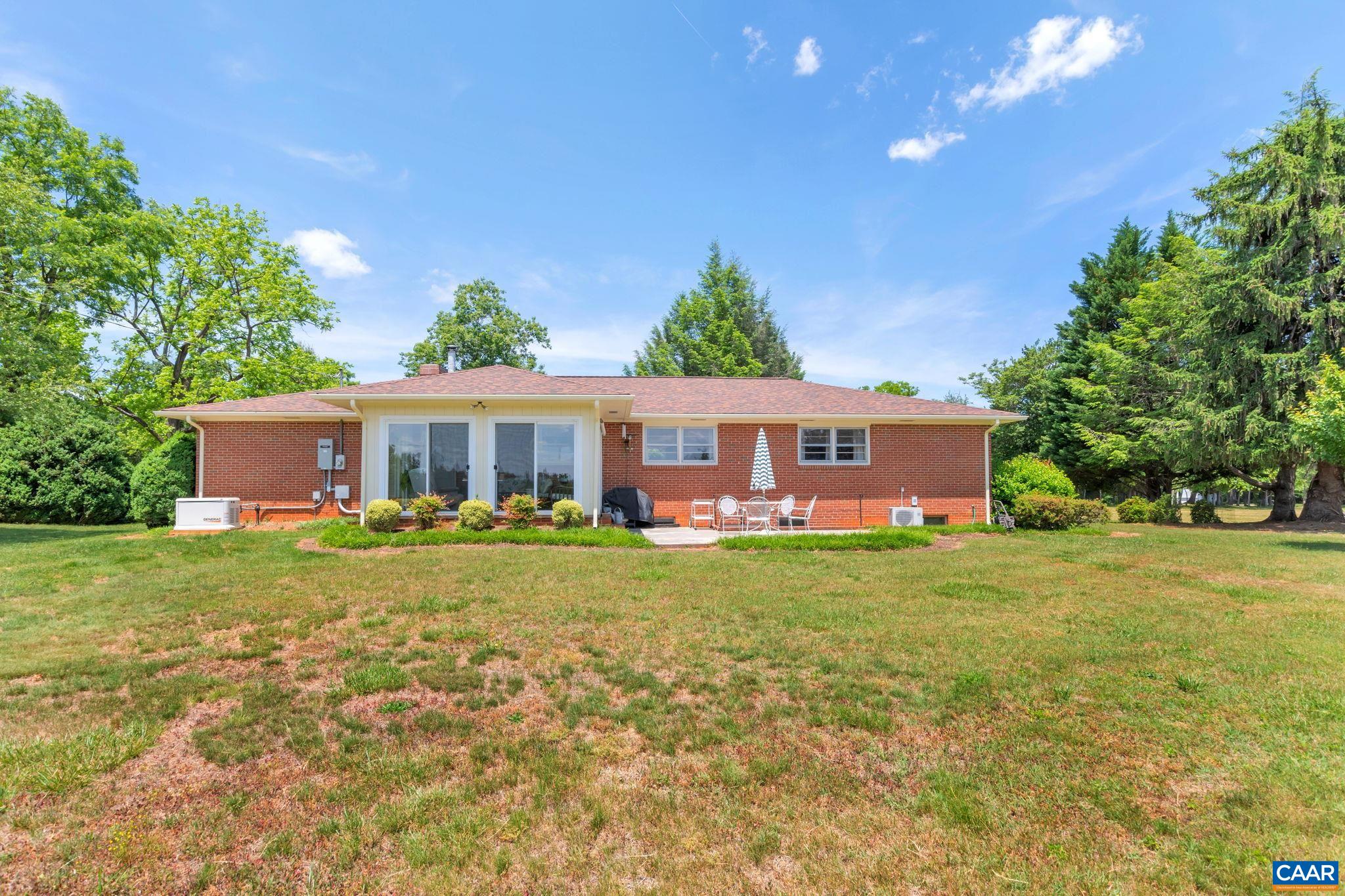 4459 Garth Road Charlottesville, VA 22901 - Photo 42 of 54 a view of a house with a yard