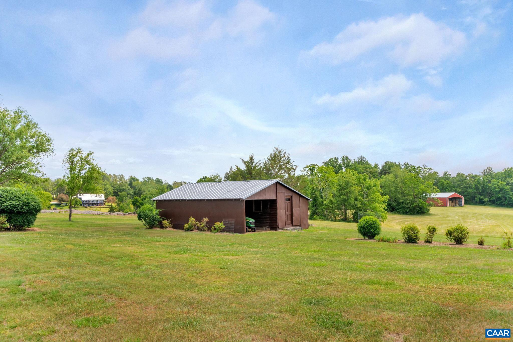 4459 Garth Road Charlottesville, VA 22901 - Photo 49 of 54 a house view with a big yard