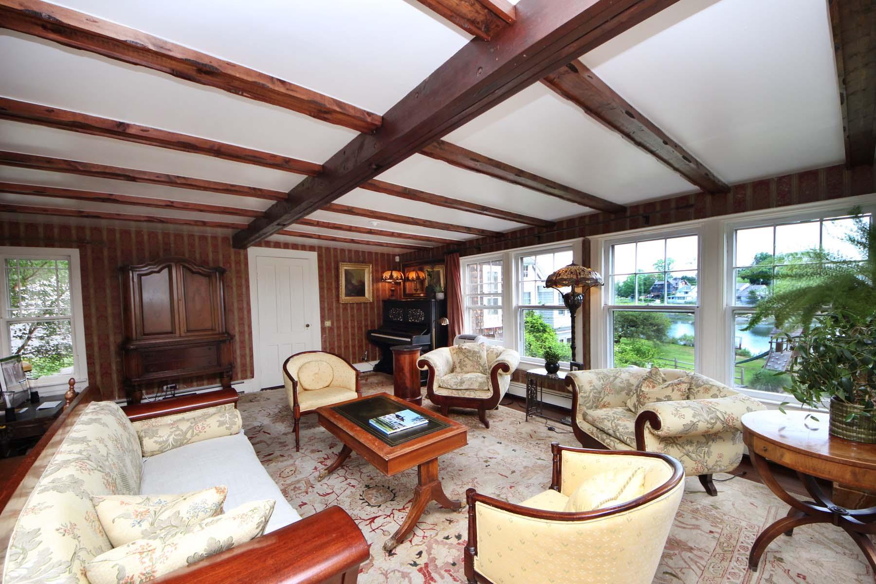 15 Ensign Road Rowayton, CT 06853 - Photo 11 of 21 a living room with furniture and a large window