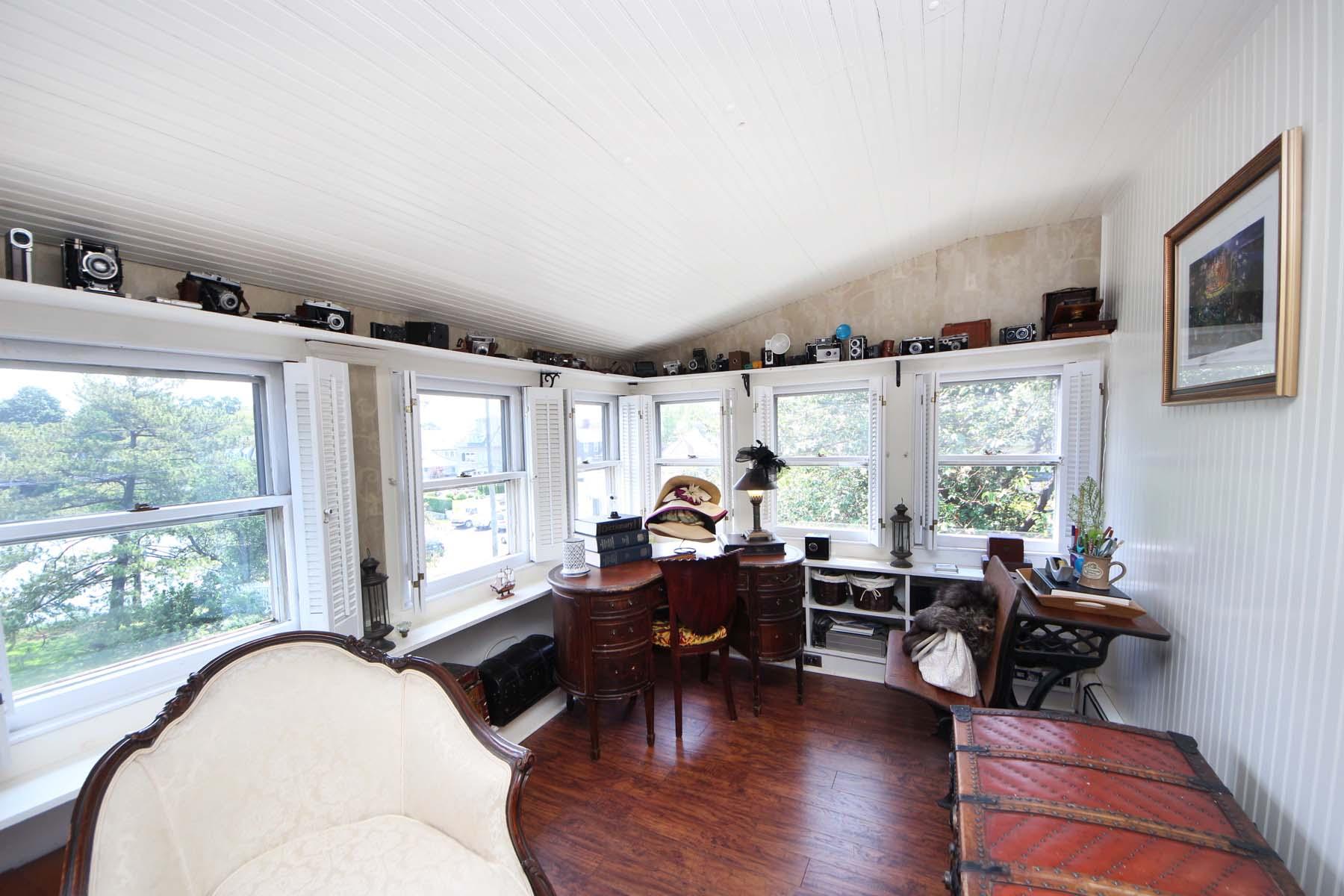 15 Ensign Road Rowayton, CT 06853 - Photo 15 of 21 a living room with furniture and a large window