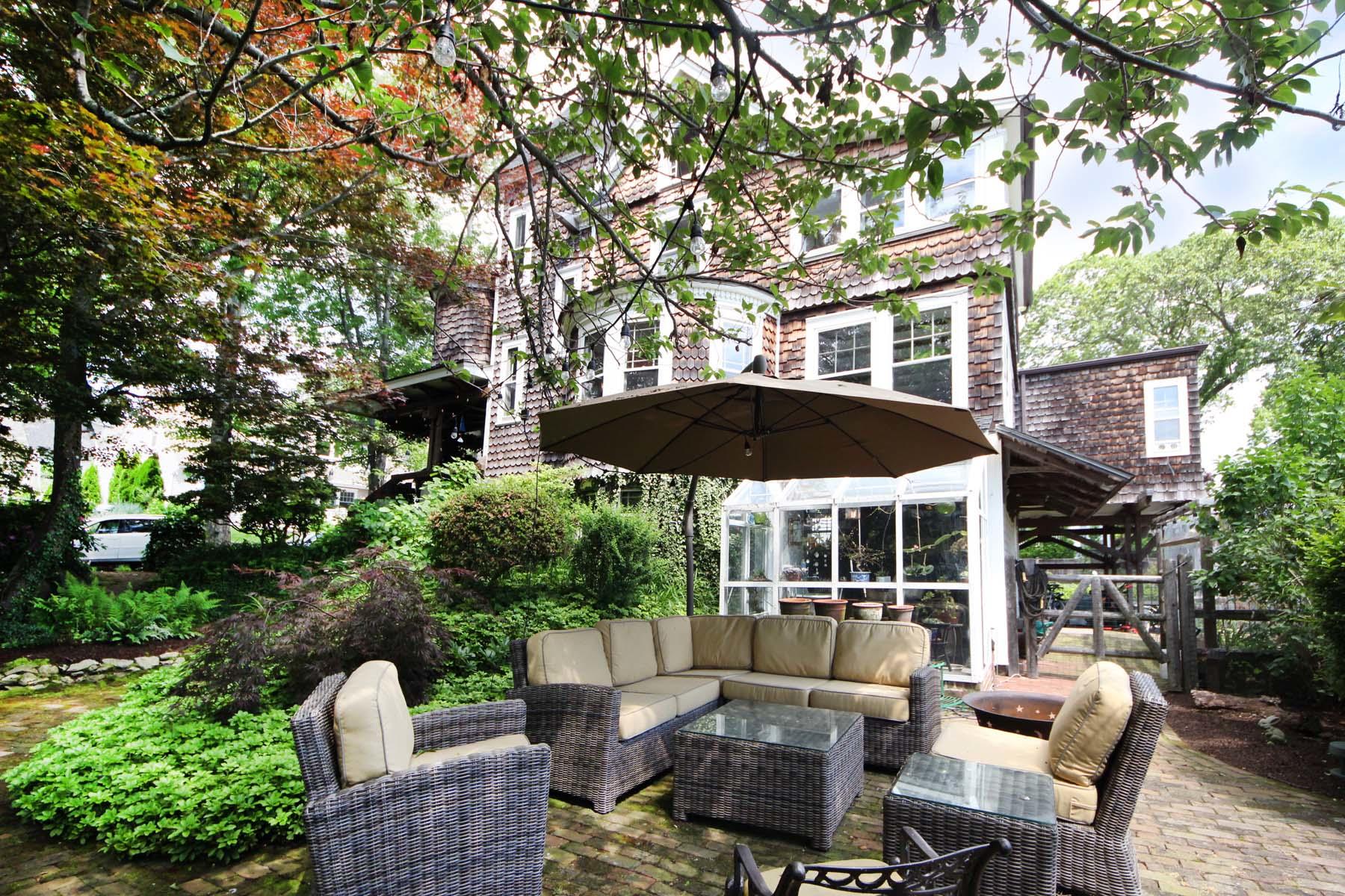 15 Ensign Road Rowayton, CT 06853 - Photo 3 of 21 a patio with hardwood table and chairs