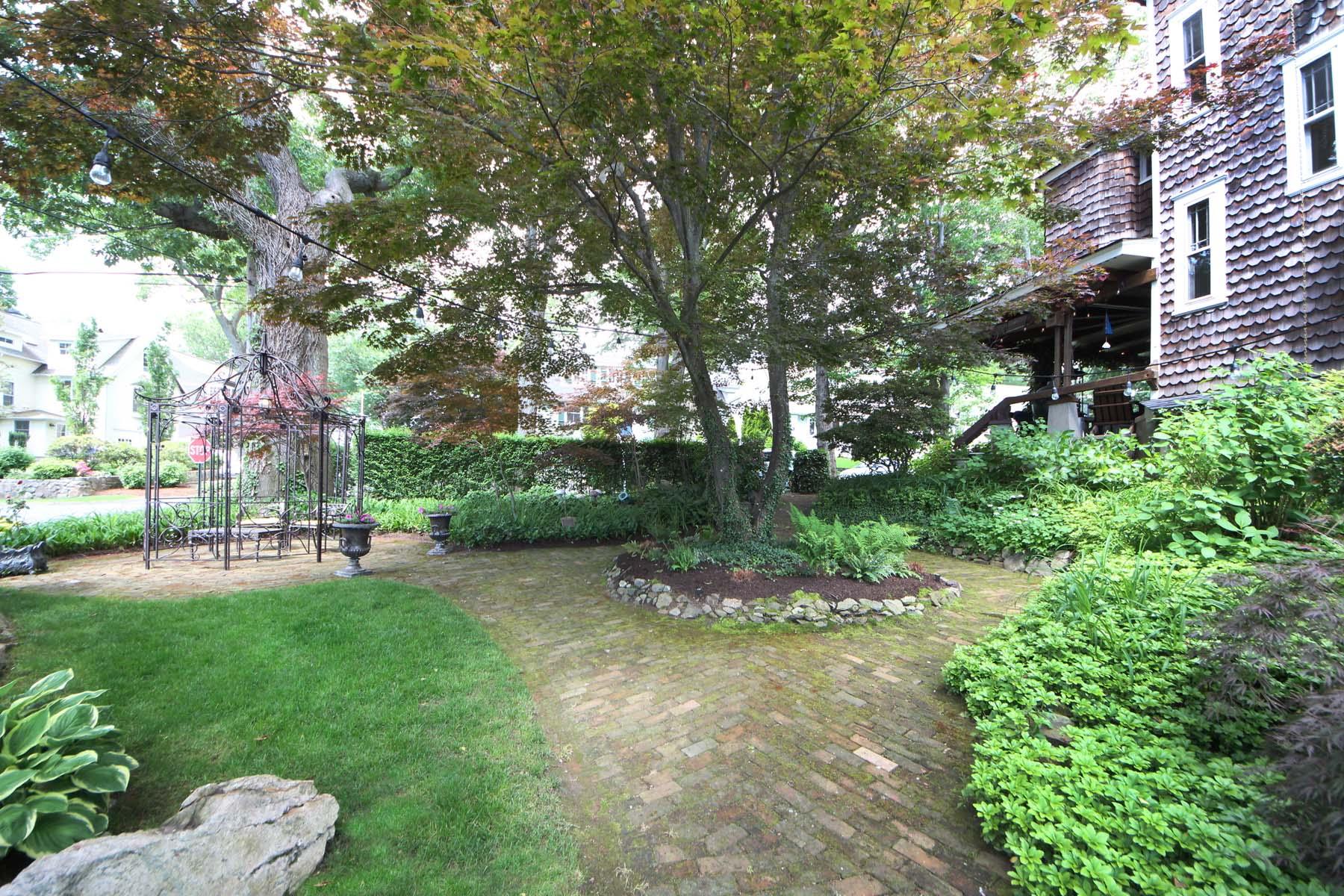 15 Ensign Road Rowayton, CT 06853 - Photo 5 of 21 a backyard of a house with table and chairs