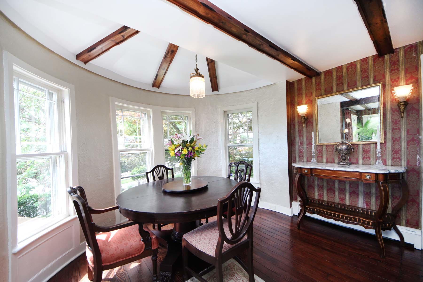 15 Ensign Road Rowayton, CT 06853 - Photo 7 of 21 a view of a dining room with furniture window and wooden floor