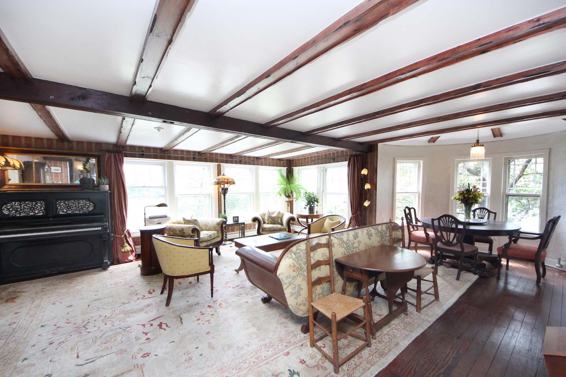 15 Ensign Road Rowayton, CT 06853 - Photo 8 of 21 a living room with furniture a rug and a chandelier