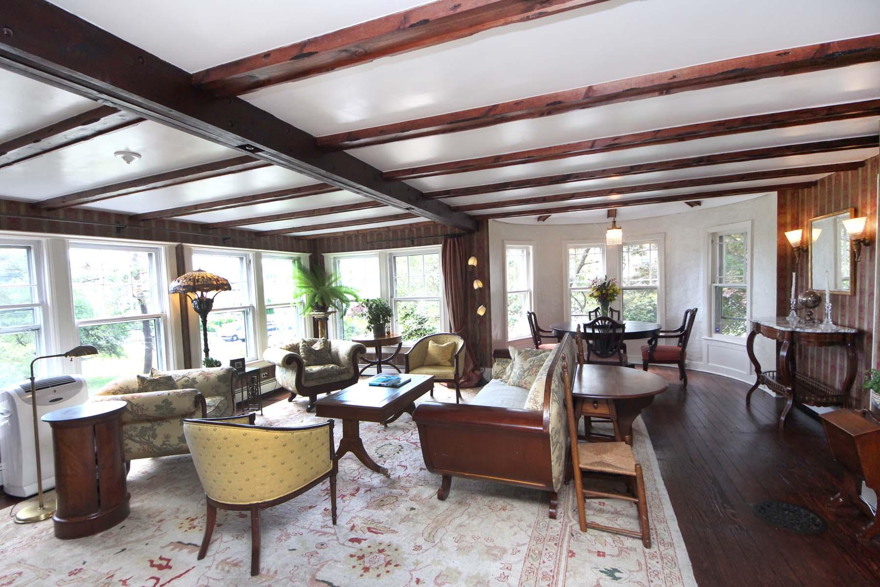 15 Ensign Road Rowayton, CT 06853 - Photo 9 of 21 a living room with fireplace furniture and a large window