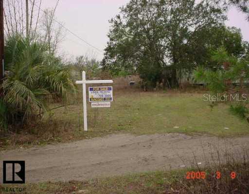 11767 Bonifay Lane Spring Hill, FL 34610 - Photo 1 of 1 Exterior Front - Front of Property Showing my sign.