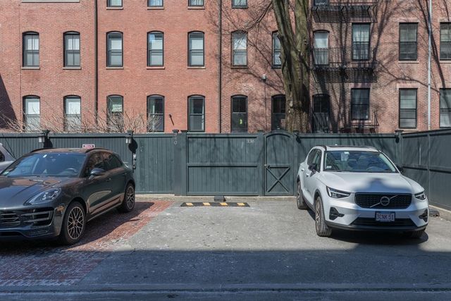a car parked in front of a building