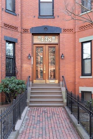 a front view of a house with a porch