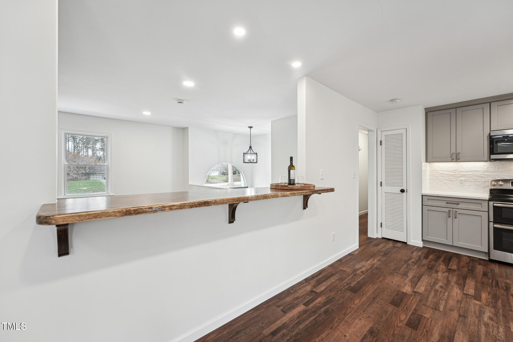 109 Chatterson Drive Raleigh, NC 27615 - Photo 16 of 51 a view of kitchen with wooden floor and electronic appliances