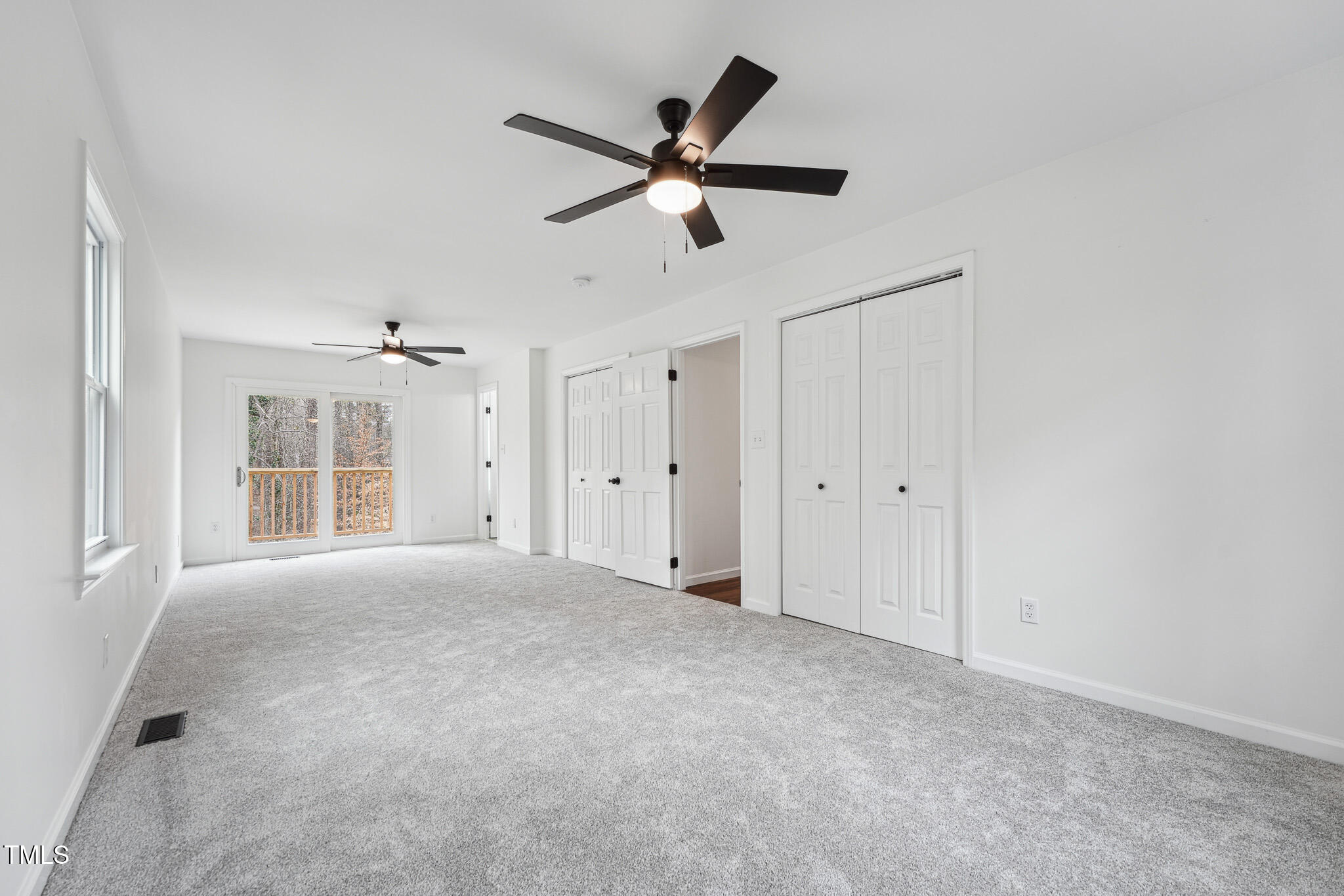 109 Chatterson Drive Raleigh, NC 27615 - Photo 19 of 51 a view of empty room with ceiling fan