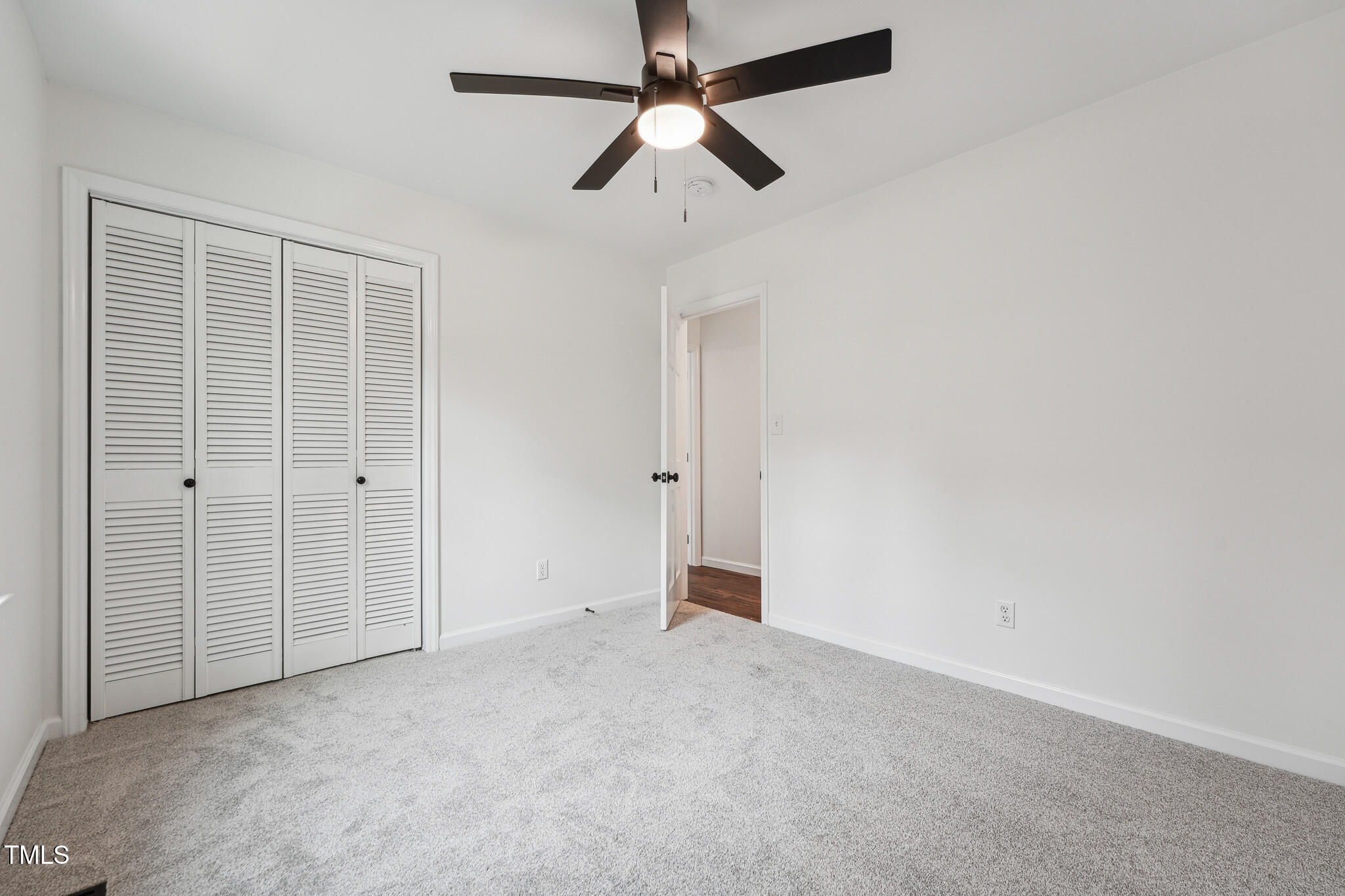 109 Chatterson Drive Raleigh, NC 27615 - Photo 25 of 51 an empty room with closet area