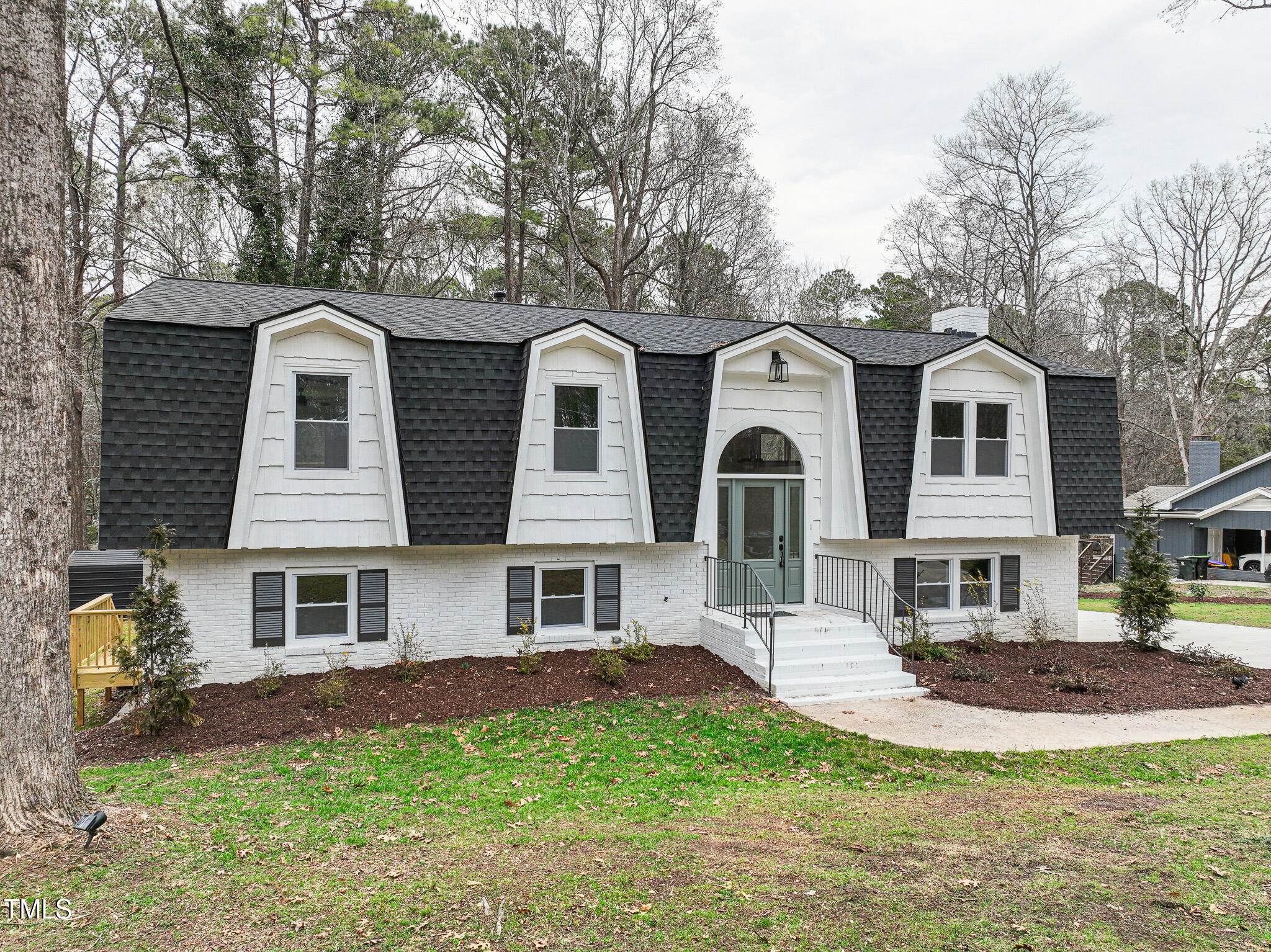 109 Chatterson Drive Raleigh, NC 27615 - Photo 2 of 51 a front view of a house with a yard