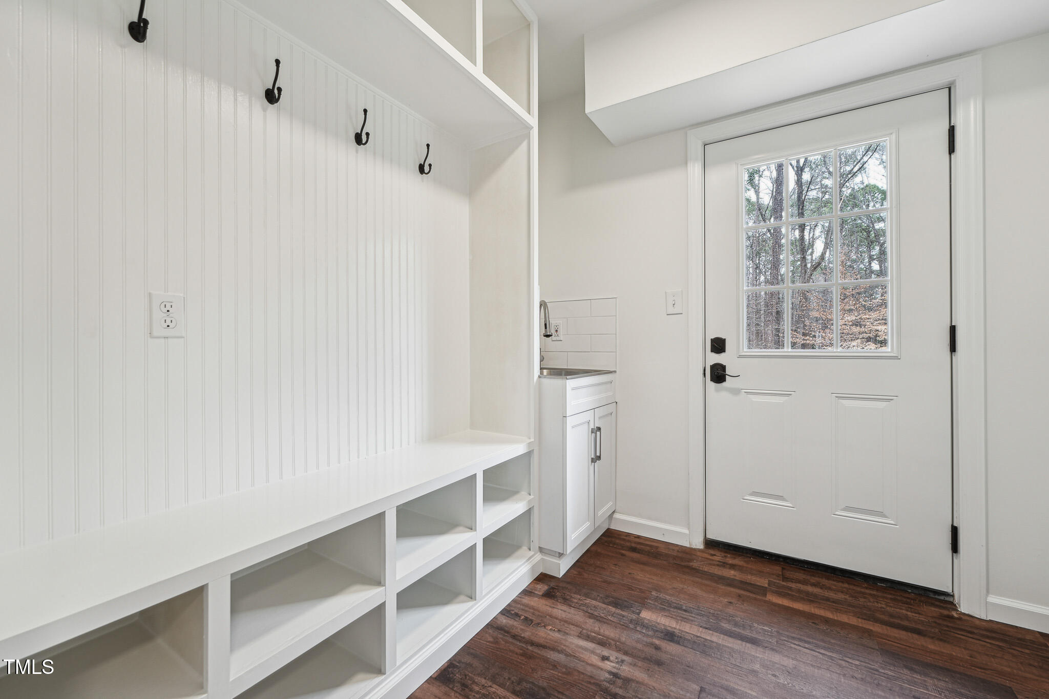 109 Chatterson Drive Raleigh, NC 27615 - Photo 40 of 51 a view of walk in closet with empty racks