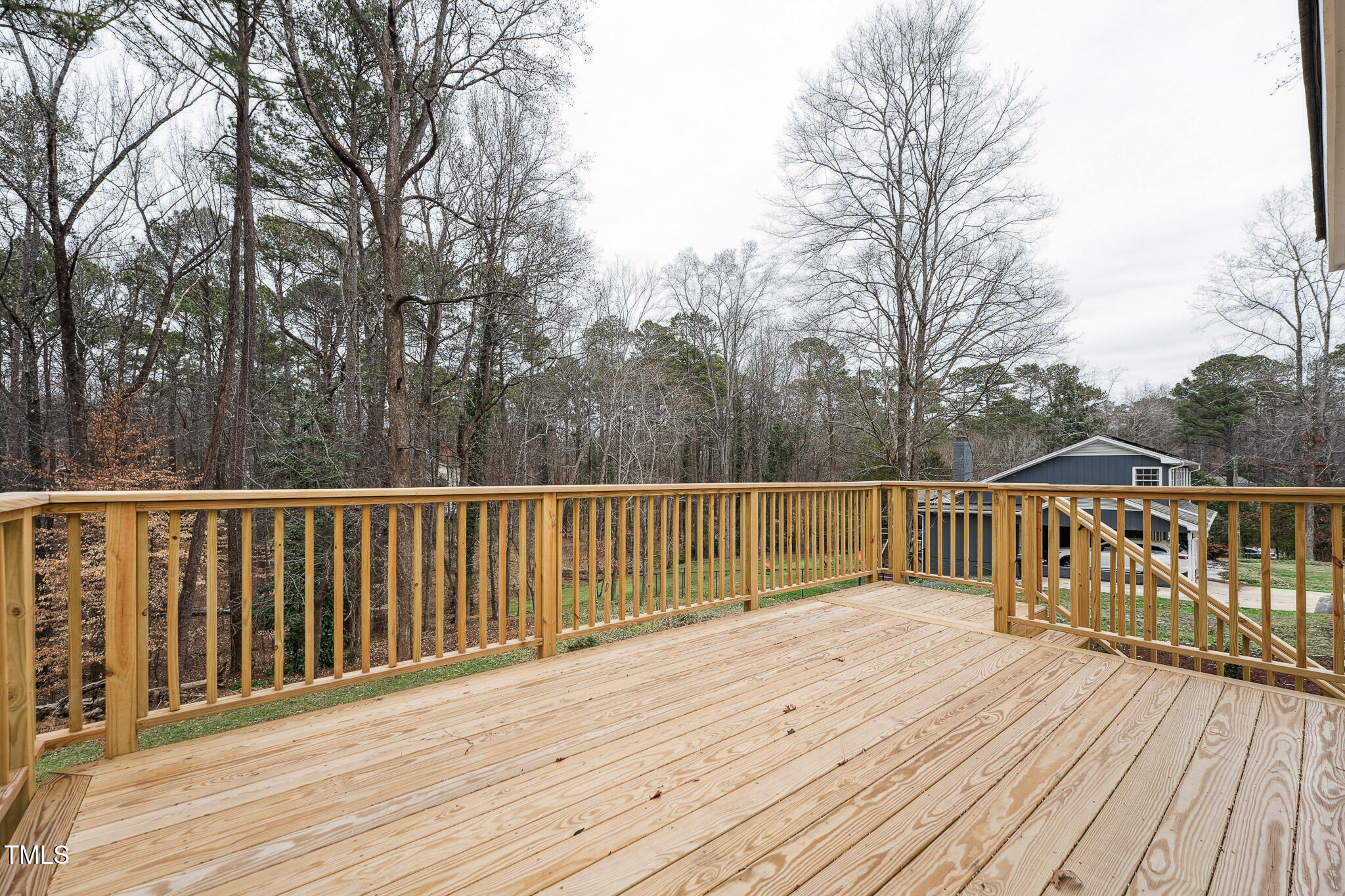 109 Chatterson Drive Raleigh, NC 27615 - Photo 44 of 51 a view of deck and wooden floor