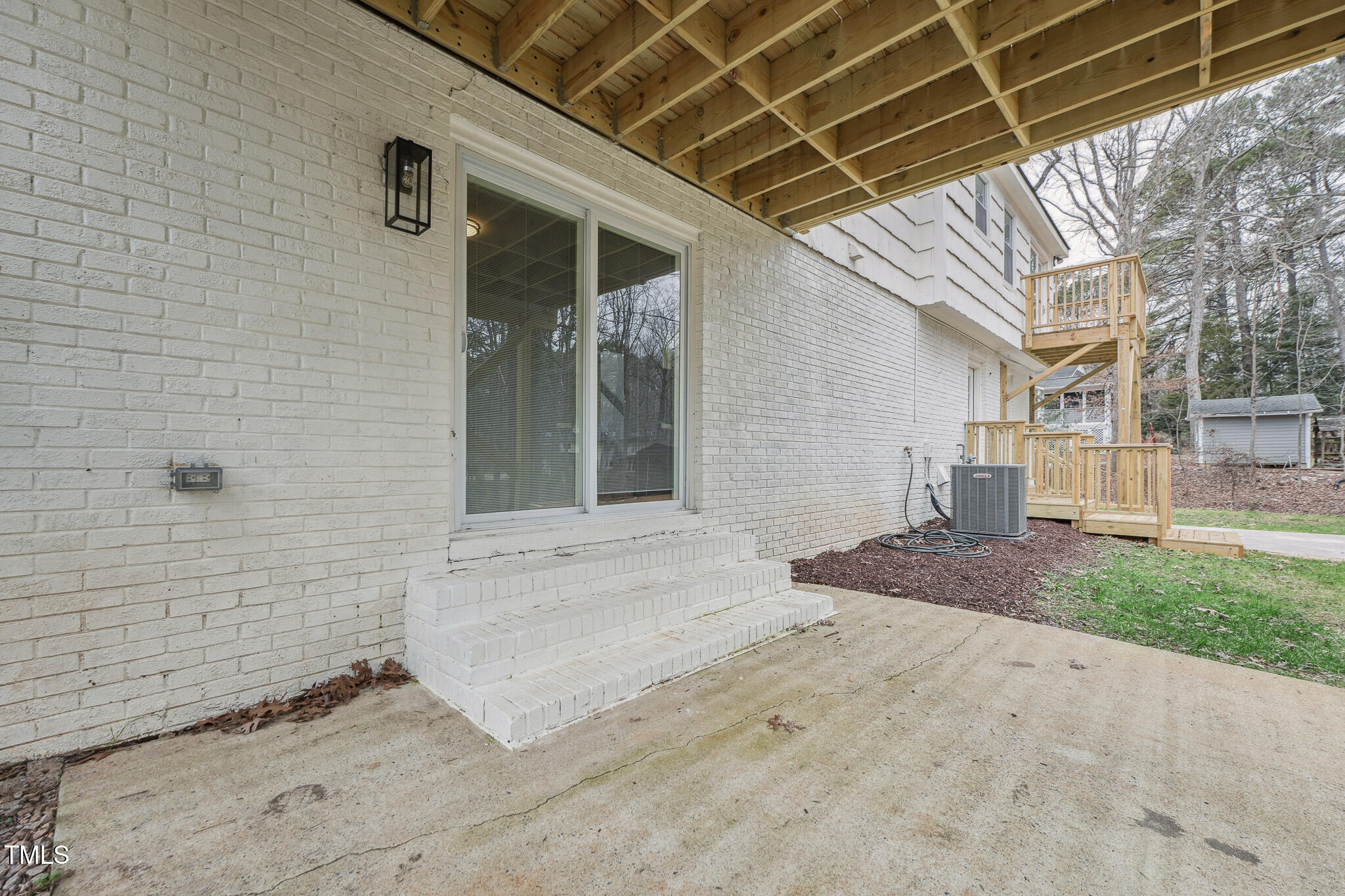 109 Chatterson Drive Raleigh, NC 27615 - Photo 45 of 51 a view of entrance gate of a house