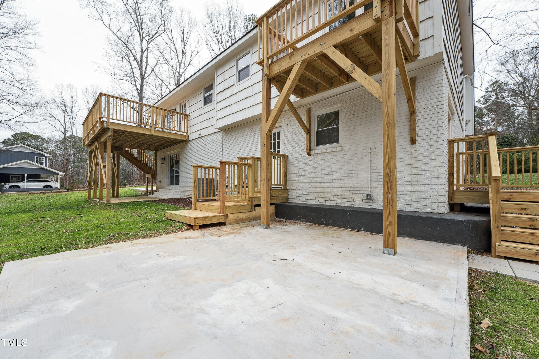 109 Chatterson Drive Raleigh, NC 27615 - Photo 47 of 51 a view of a house with a yard and sitting area