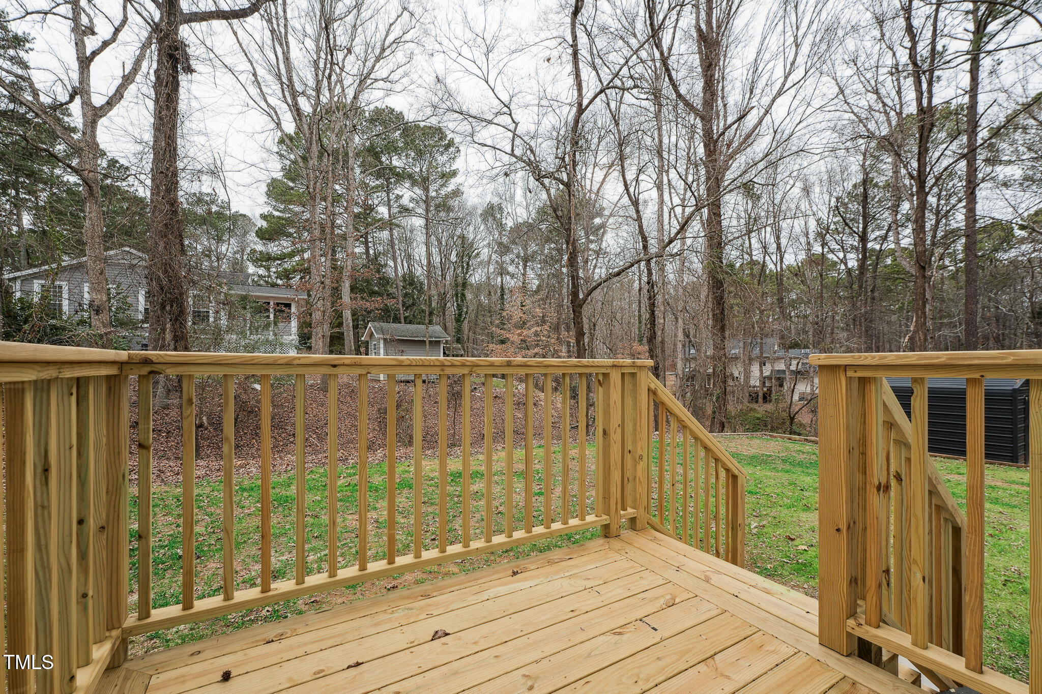 109 Chatterson Drive Raleigh, NC 27615 - Photo 48 of 51 a view of balcony with wooden floor and fence