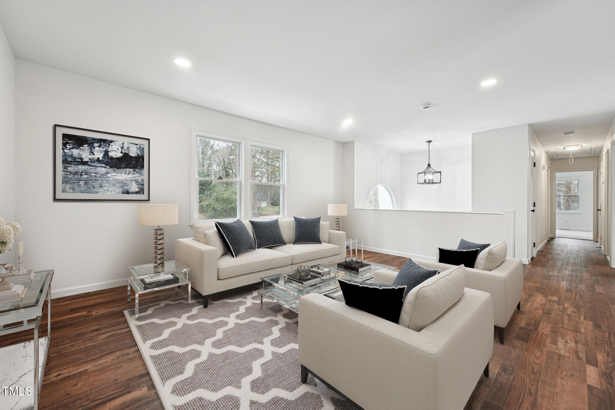 109 Chatterson Drive Raleigh, NC 27615 - Photo 4 of 51 a living room with furniture and a couch